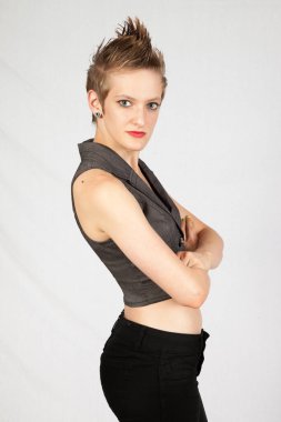 Thoughtful woman with her arms crossed