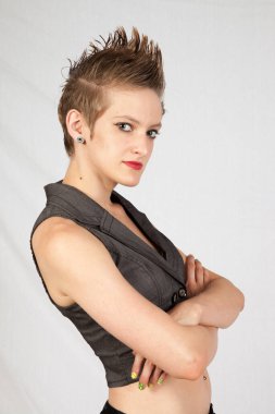 Thoughtful woman with her arms crossed