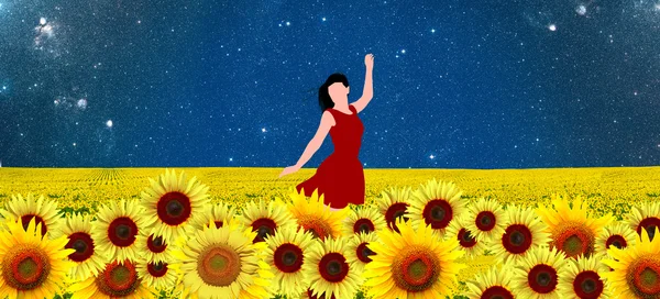 Tänzerin in einem Sonnenblumenfeld im roten Kleid lizenzfreie Stockfotos