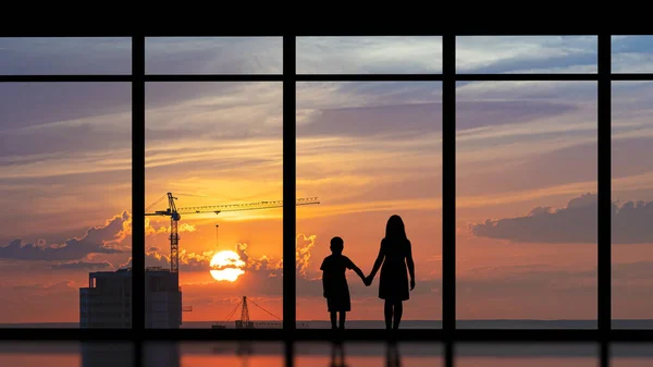 Boy Girl Standing Panoramic Window City Sunset — Photo