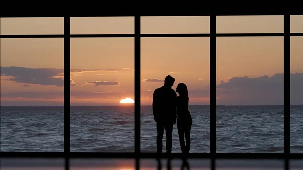 Man Woman Standing Panoramic Window Sea Sunset — Photo