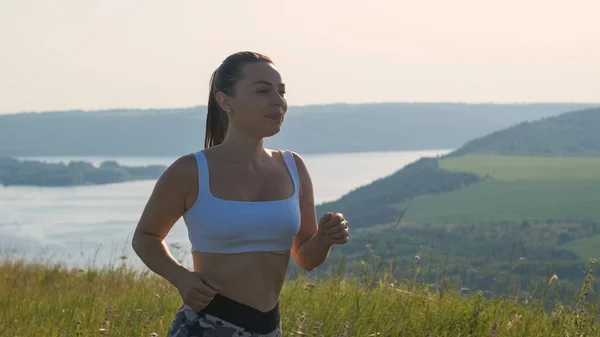 Beautiful Woman Jogging Picturesque Background — kuvapankkivalokuva