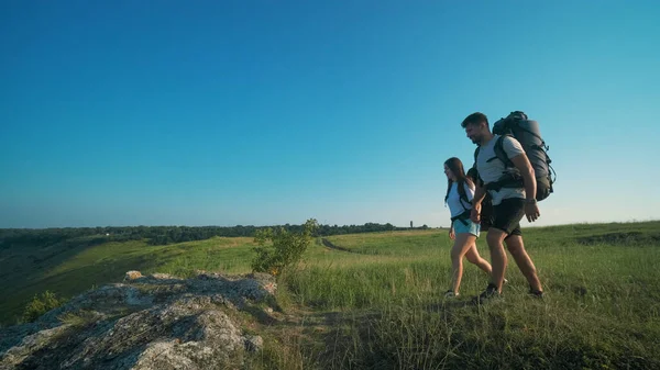 Man Woman Walking Backpacks Blue Sky Background — Stok Foto