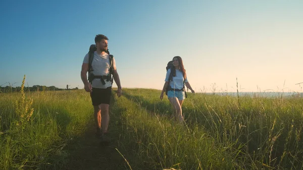 Two Travelers Walking Backpacks Blue Sky Background — Stok Foto