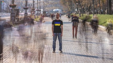 The ukrainian man standing on the crowded street