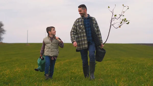 Dad His Little Son Going Plant Tree — kuvapankkivalokuva