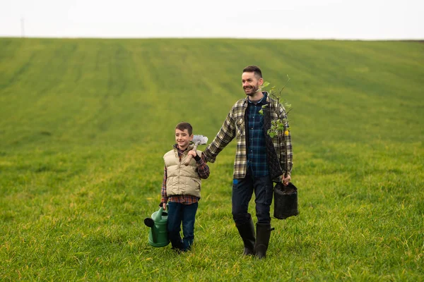 Handsome Man His Son Working Field – stockfoto