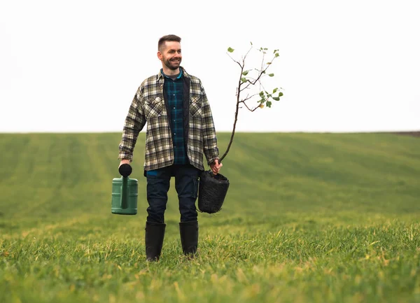 Yound Gardener Going Plant Tree Field — kuvapankkivalokuva