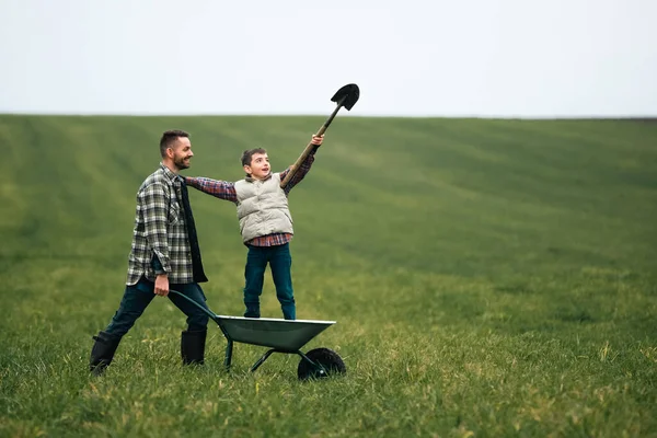 Young Farmer His Son Have Fun Field — Stok Foto