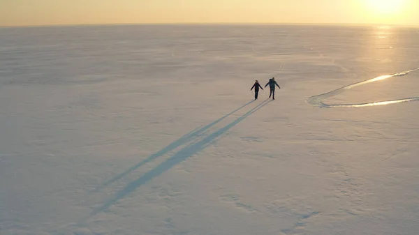 Upper View Two Tourists Trekking Icy Field — kuvapankkivalokuva