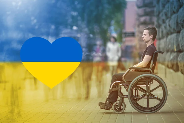 Invalid Man Sit Wheel Chair Ukrainian Flag Background — Stok Foto