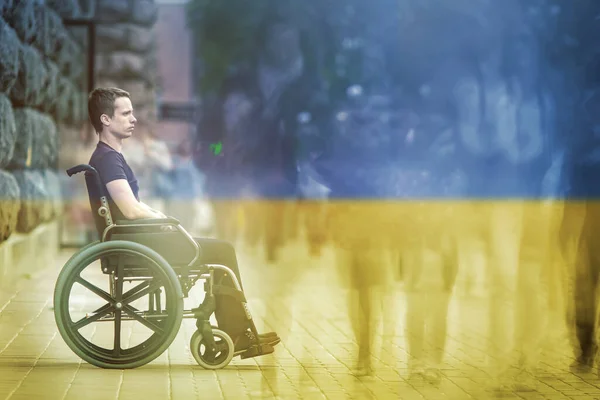 Invalid Man Sit Wheel Chair Ukrainian Flag Background – stockfoto