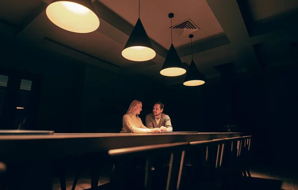 Romantic Couple Sitting Table Empty Night Restaurant Stock Photo