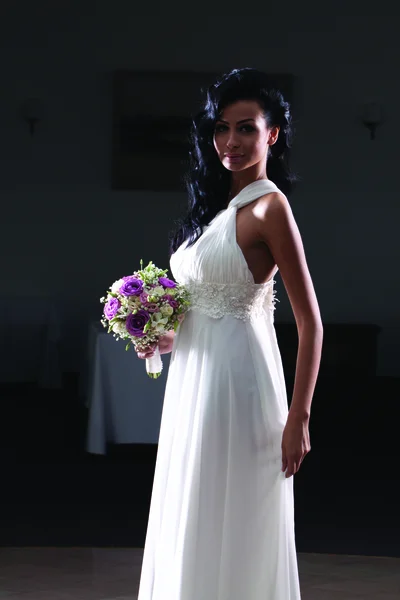Full length, indoor portrait of sexy bride with long black hair — Stock Photo, Image