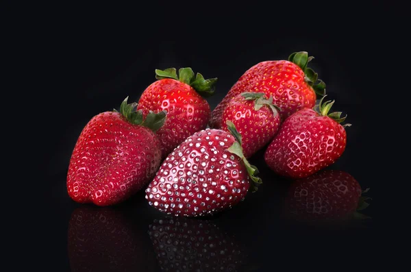 Strawberries - one encrusted with crystals. — Stock Photo, Image