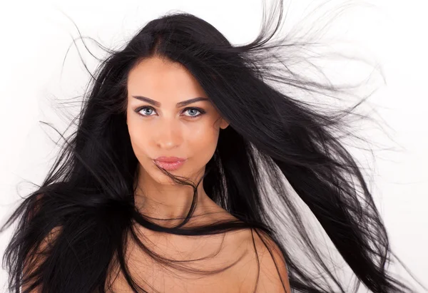 Beautiful woman with long straight hair — Stock Photo, Image