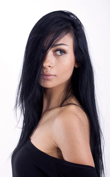 Primer plano de hermosa mujer joven con el pelo negro Fotos de stock