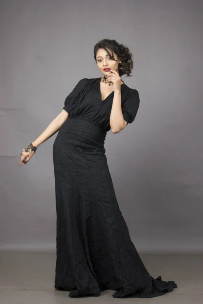 Beautiful Female Model Fashionable Black Gown Front Solid Background Studio —  Fotos de Stock