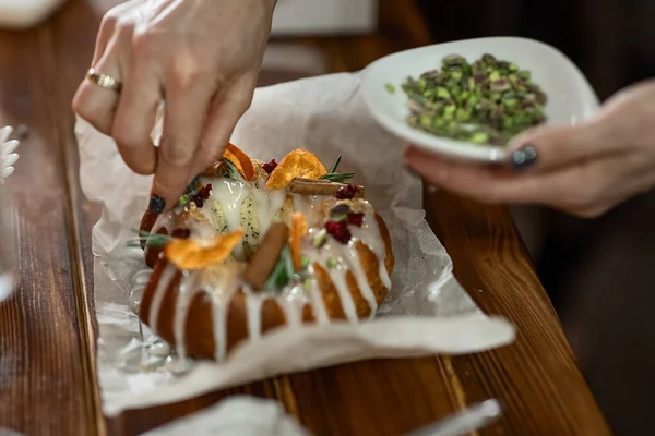 the process of decorating a Christmas cake with your own hands, the concept of New Year holidays