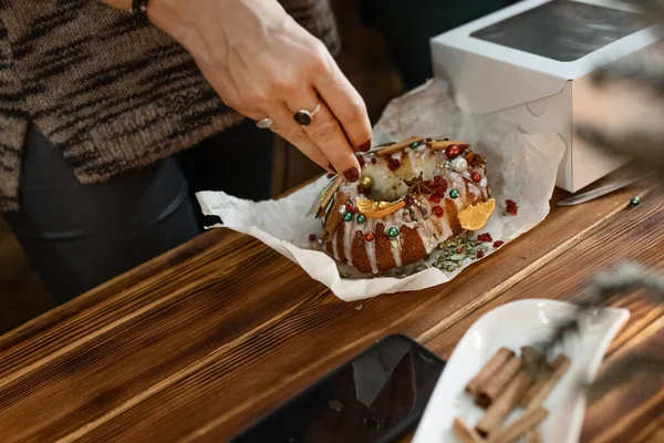the process of decorating a Christmas cake with your own hands, the concept of New Year holidays
