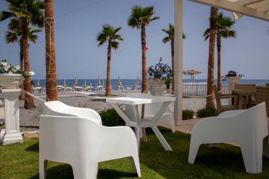 Furniture decoration and exterior design of a cafe and resort for tourists traveling and taking pictures in Calabria, Italy. Summer cafe interior.