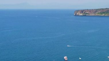 Aerial View. Yachts are Parked Near luxary Houses. Calabria, Italy. Aerial View of Rocky Coastline With Stunning Turquoise Water.