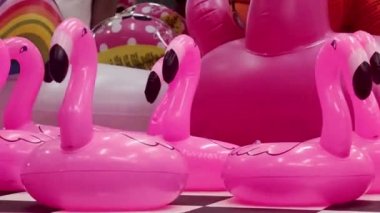 Inflatable Circles in the Form of a Flamingo Bird on the Background of the Amusement Park. Creative Minimal Summer Concept. Happy Childhood.