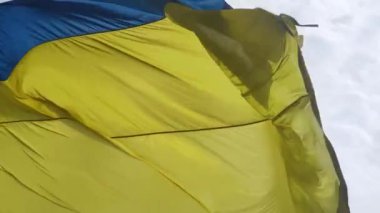 Detail of the National Flag of Ukraine Waving in the wind on a Clear Day. Democracy and Politics. Country of Eastern Europe. Patriotism.