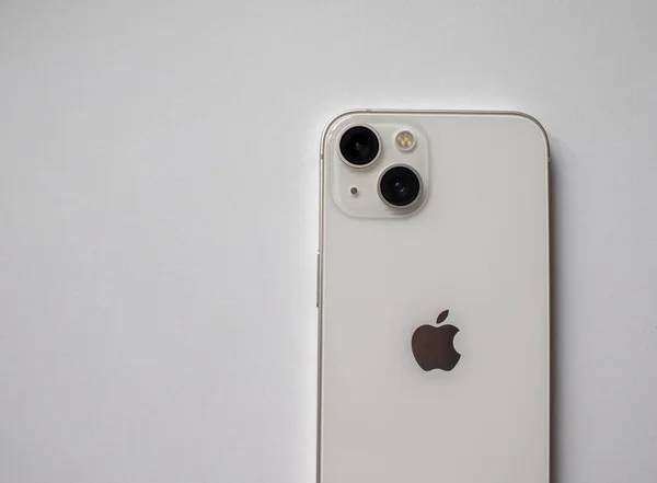 Zhytomyr, Ukraine, August 20, 2022: Iphone 13 pro Mockup, White Screen Smartphone Mockup, Mobile Phone Close up. New iPhone 13 Pro Design. Stylish Look of the New IPhone with a Metal Body and Cameras.