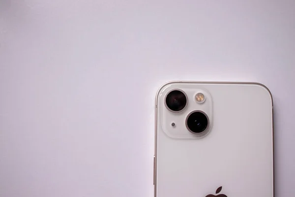 Zhytomyr, Ukraine, August 20, 2022: Iphone 13 pro Mockup, White Screen Smartphone Mockup, Mobile Phone Close up. New iPhone 13 Pro Design. Stylish Look of the New IPhone with a Metal Body and Cameras.