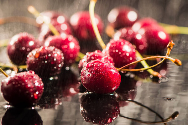 herries in water.Cherries in water splash. Sweet berry macro background. Fruits Vitamins Health