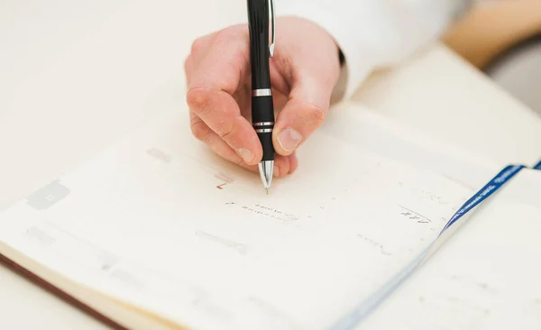 Zakenman Schrijft Een Notebook Routine Business Plan Stockfoto