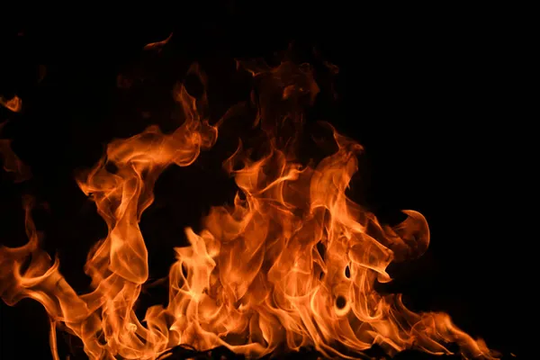 Огненное пламя движения картина абстрактной текстуры. Пылающий огонь, огненный фон. — стоковое фото