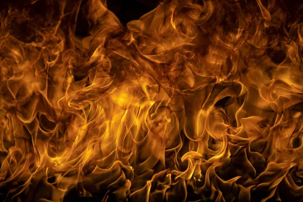 Fire flame. Burn lights on a black background. — Stock Photo, Image
