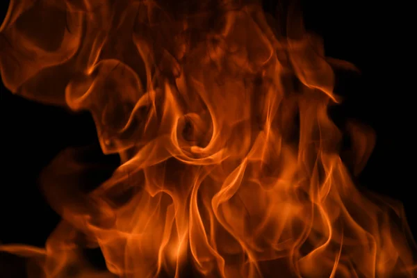 Feurige Textur auf schwarzem Hintergrund. Abstraktes Feuer Flammenhintergrund, großes brennendes Feuer. — Stockfoto