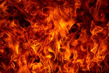 Yangın alevi siyah arkaplanda izole edildi. Alevler, soyut doku. Ateş deseni için sanat tasarımı, alev dokusu.