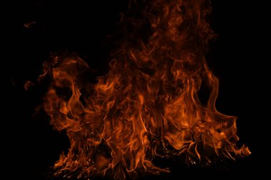 Sancak arka planı için ateş dokusu. Soyut ışıkları yakın. Alev alev yanıyor. Arkaplanı alevler kaplıyor.