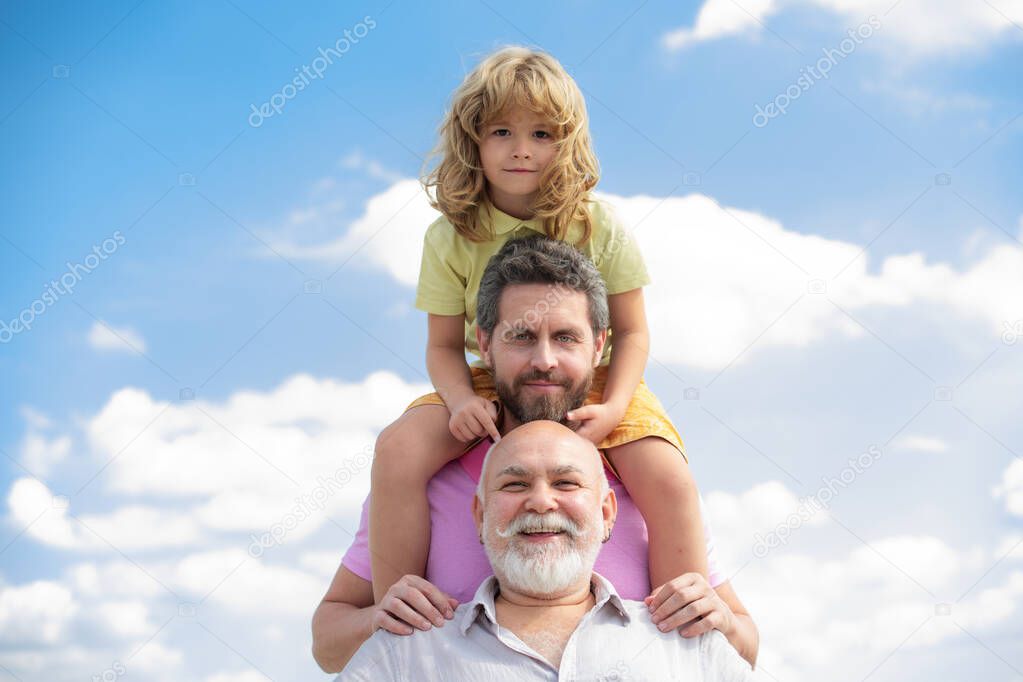 Portrait of men generation grandfather father and grand son outdoor on sky. Fathers day concept. Men in different ages. Funny men faces.