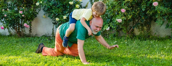 Two generation, weekend together. Grandfather and grandchild, spring banner. — Stock Photo, Image