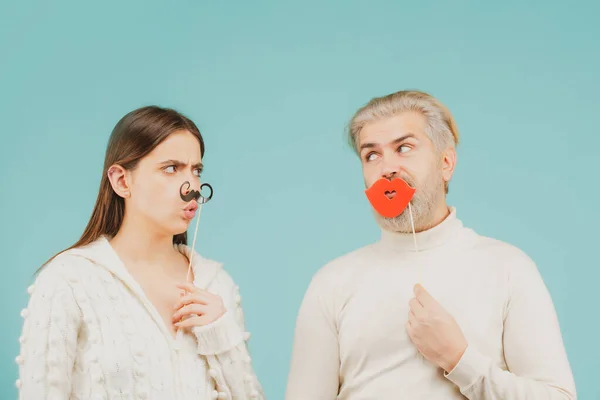 Couple with with fake mustache and lips. Having fun. Photo booth concept. — Stock Photo, Image