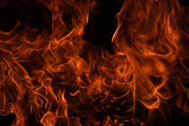 Sanat arkaplanda yanan ateş alevi.