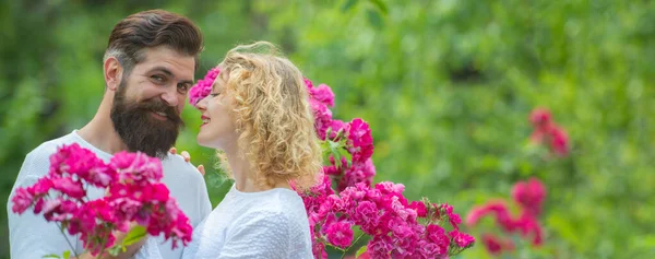 Spring couple in love, banner. Beautiful young couple kissing and embracing. Beautiful young sensual woman love affectionate man. Romantic couple in love looking at each other. — Foto Stock
