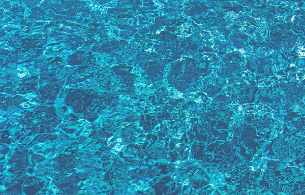 Hintergrund des Wassers, Oberfläche blaues Schwimmbad. — Stockfoto