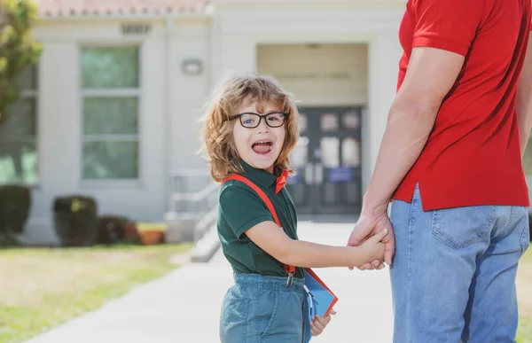 Father and funny excited son after school. — Stock Photo, Image