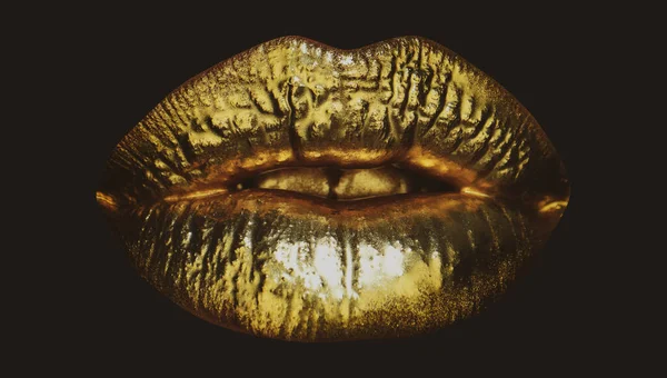 Gold lips. Gold paint from the mouth. Golden lips on woman mouth with make-up. Sensual and creative design for golden metallic. Golden make up. Isolated on black. — Stock Photo, Image