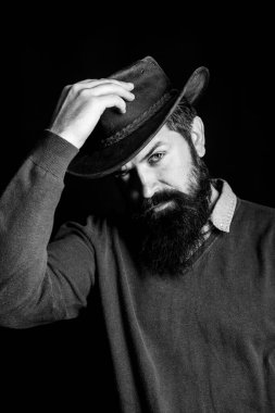 Kovboy şapkalı adam. Amerikalı çiftçi. Batı ve silahlar. Teksas.