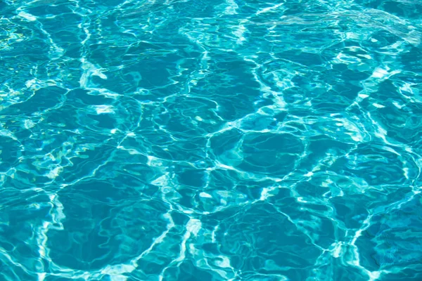 Pool water background, blue wave abstract or rippled water texture