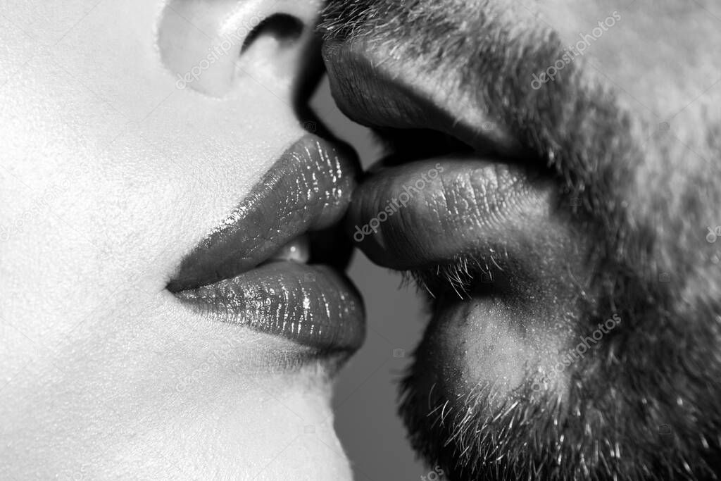 Sexy lips of man and woman kissing.