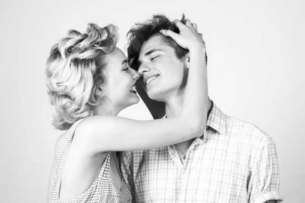 Beautiful young couple hugging and holding each other in studio. Beautiful young smiling couple in love. Love. Portrait happy loving couple. Fashion. Close up. Smile joyfully have good relationships. — Stock Photo, Image