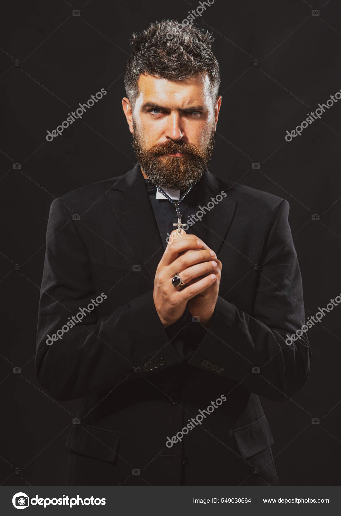 Portrait of monk man priest with pray. Praying oblation. Senior